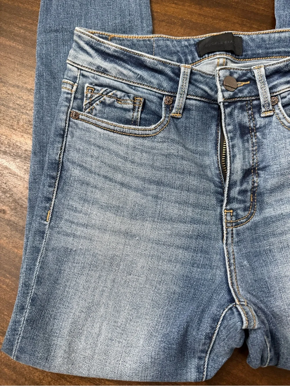 Buckle Faded Blue Skinny Jeans with Raw Hem - Picture 4 of 9